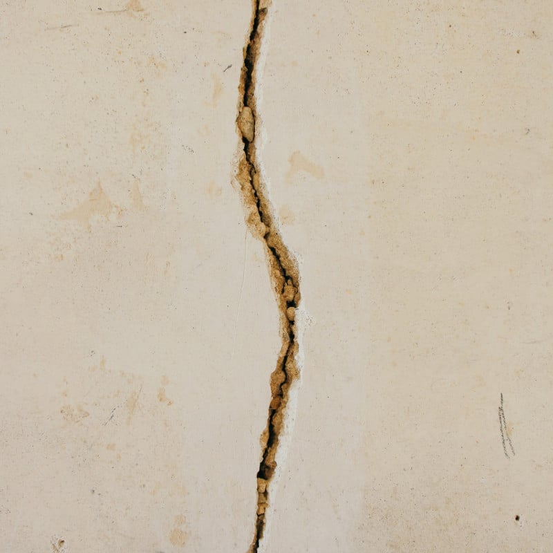 An image of a crack in the surface to represent the division which can occur in a relationship during or after cancer treatment