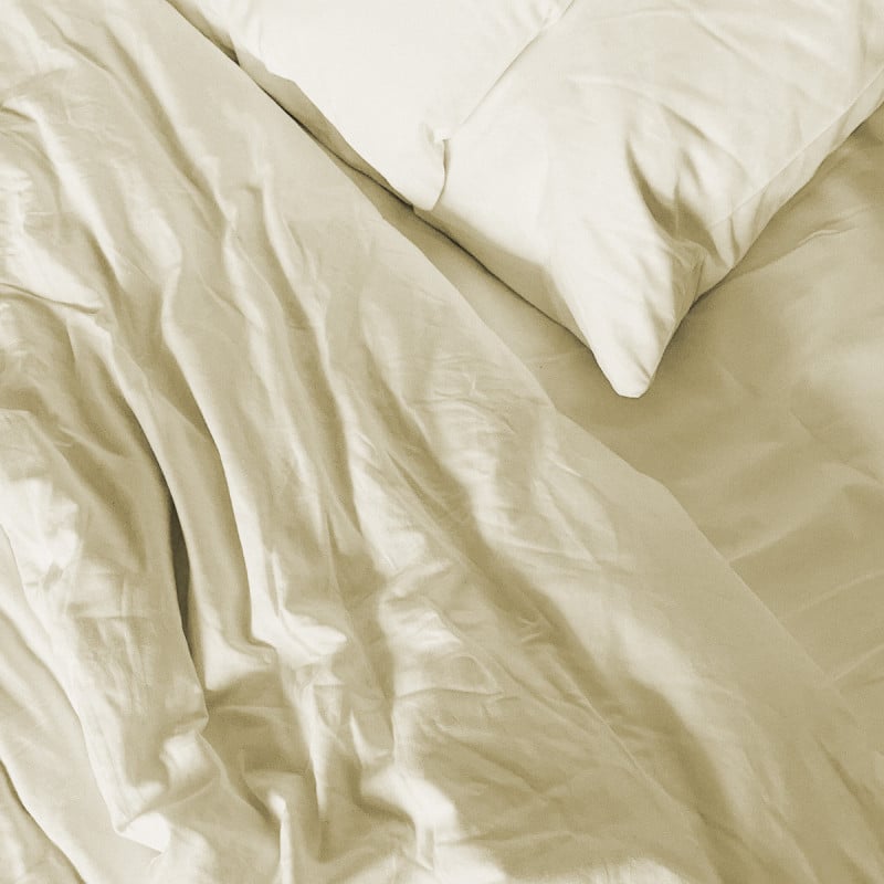 An image of a unmade bed